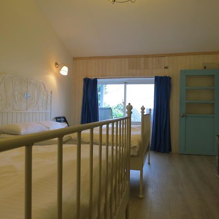 Sunnyrain Hostel Джиуфен Екстериор снимка