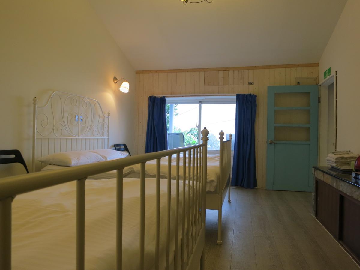 Sunnyrain Hostel Джиуфен Екстериор снимка